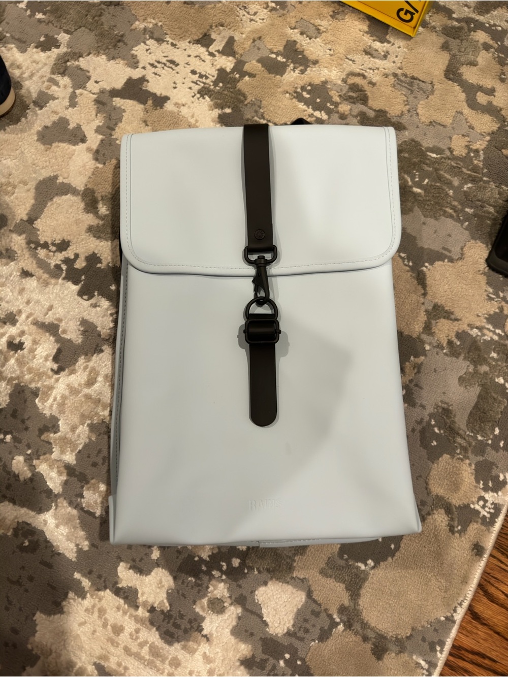 Rains Light Blue Waterproof Backpack with Black Strap, New Without Tags